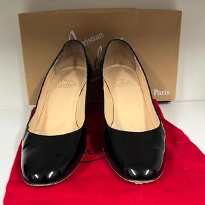 Authentic Christian Louboutin Miss titck patent leather black pumps. 2.25" heel.